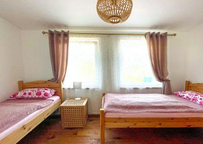 Schlafzimmer 2 | FeWo HERZENSLUST | Ostsee Ferienwohnungen in Büttelkow
